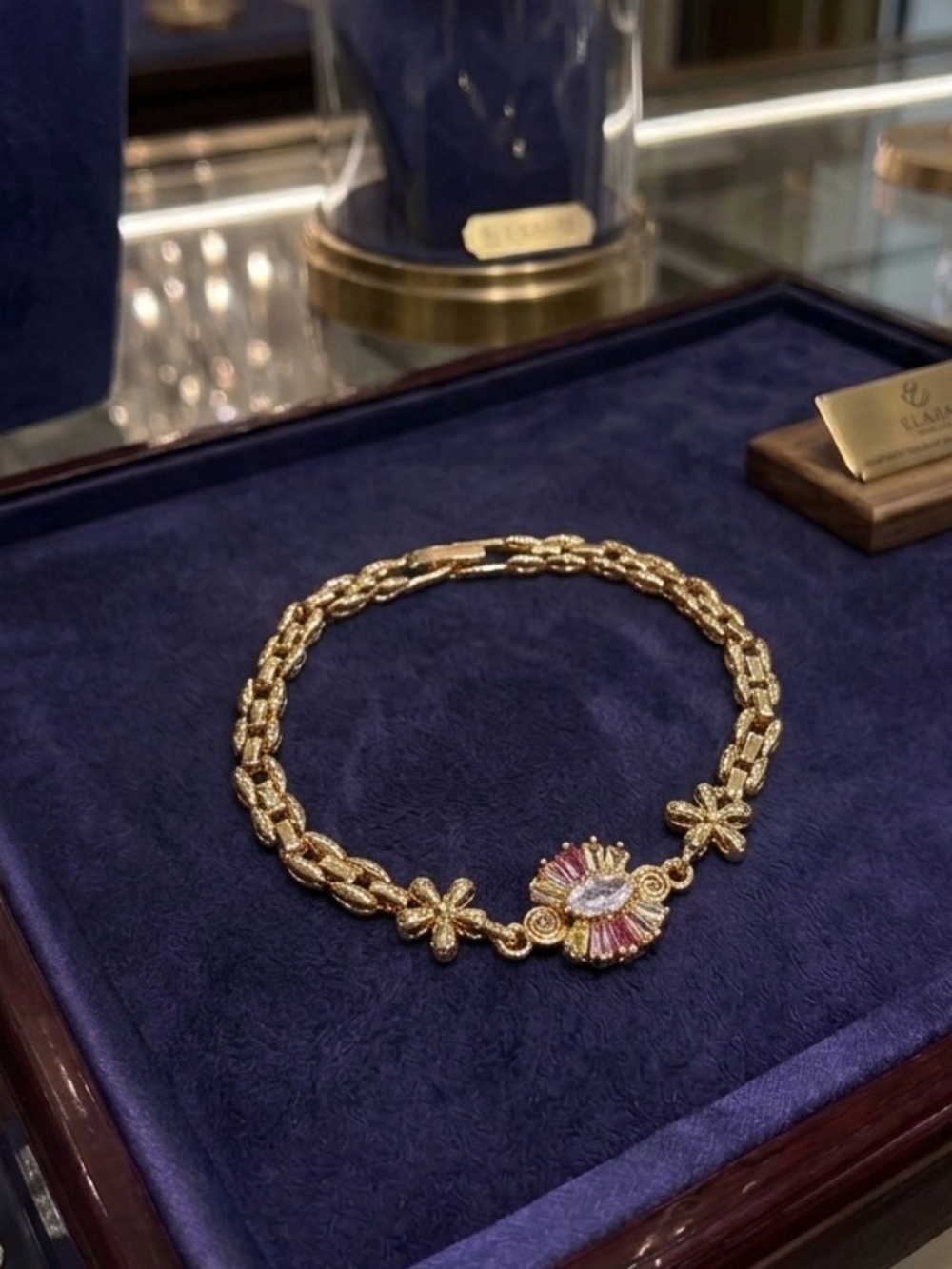 Gold Tone Floral Chain Necklace with Crystal Accent